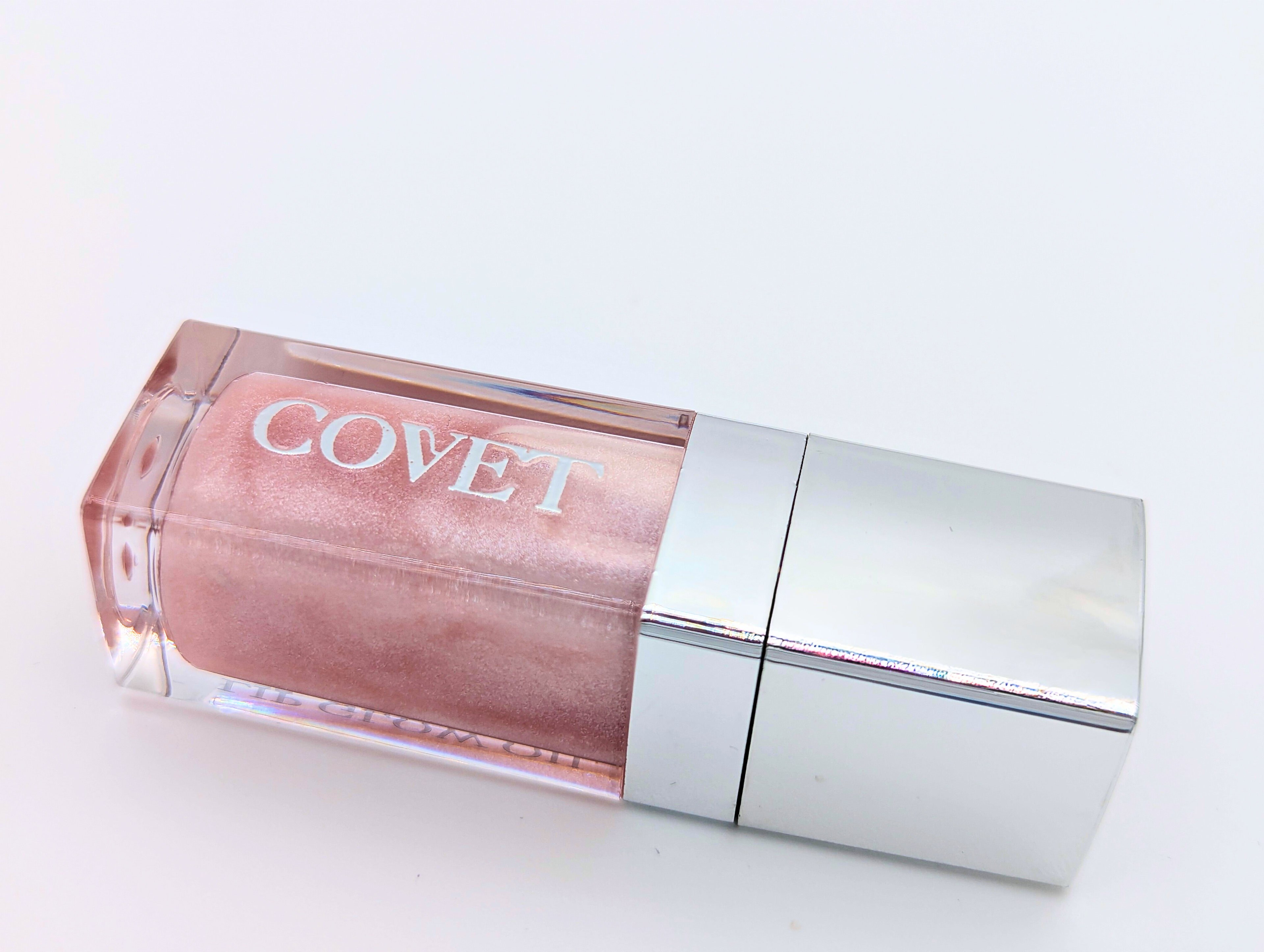 Lip gloss No. 7 Tease by 'COVET' on a light background