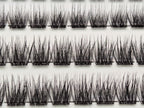 Close-up of Covet Beauty Trance cluster lashes showing airy, separated clusters arranged in rows.