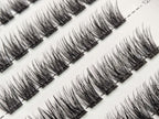Close-up of Covet Beauty Trance cluster lashes showing soft, wispy fibers and a gentle curl in the tray.