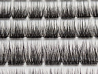 Covet Beauty Velvet cluster lashes shown close-up in the tray with rows of dense, defined crisscross lash fibers.