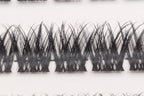 Covet Beauty Obsession cluster lashes shown close-up with a dense crisscross lash pattern.